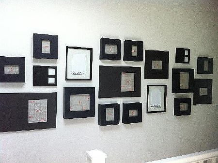 Collage of frames for family photos up a staircase